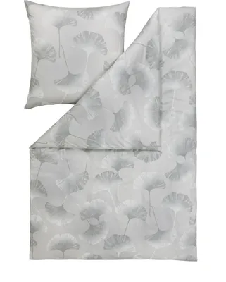 A pillowcase and duvet cover set with a ginkgo leaf pattern.