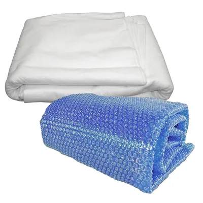 A white fabric cover and a blue bubble wrap solar cover are folded and placed on a white background.