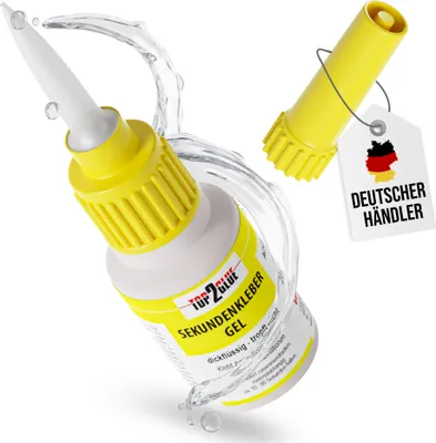 A bottle of super glue with a yellow cap and applicator, shown with water splashes around it. A separate yellow cap is shown with a tag attached.