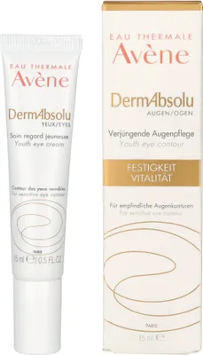 A product shot of an eye cream tube and its packaging.