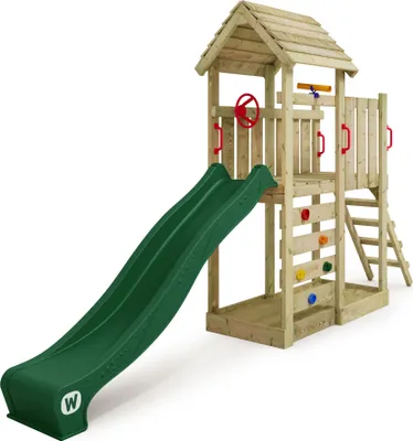 A wooden play structure with a green slide, climbing wall, and ladder against a white background.