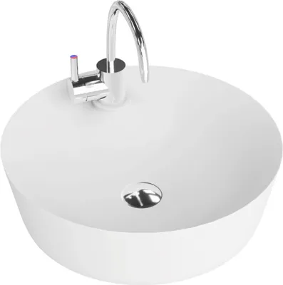A white ceramic sink with a chrome faucet on a white background.