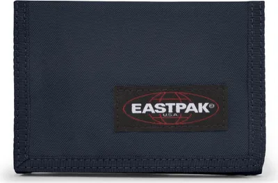 A navy blue Eastpak wallet is shown against a white background.