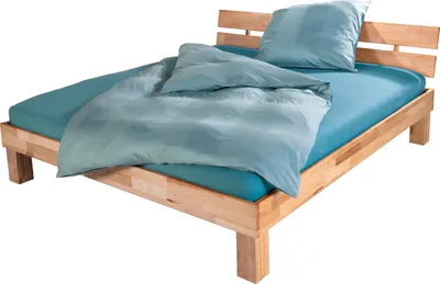 A wooden bed frame with blue bedding and a pillow, shown against a white background.