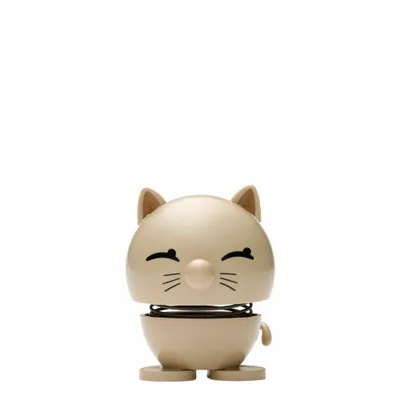 A small, beige cat-shaped figurine with a spring in its neck, designed to wobble.