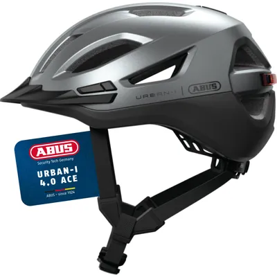 Produktbild von ABUS Stadthelm Urban-I 4.0 ACE - Fahrradhelm mit aufladbarem Rücklicht, 4 Leuchtmodi, Schirm, Zopf-Öffnung und magnetischem Verschluss - für Jugendliche, Frauen und Männer - Größe L, silber
