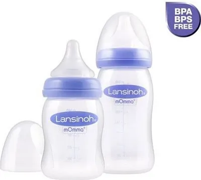 Two baby bottles and a cap are displayed against a white background. A purple badge with white text is in the upper right corner.
