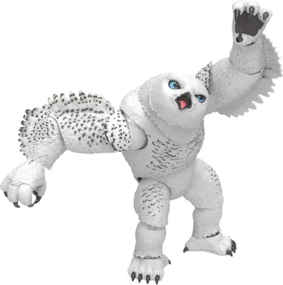 A toy figure of a mythical creature, an owlbear, is posed in an action stance against a white background.