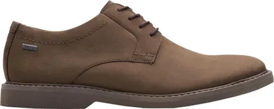 A side view of a brown shoe.