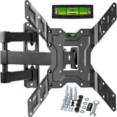 A black TV wall mount with included hardware and a spirit level, displayed against a white background.