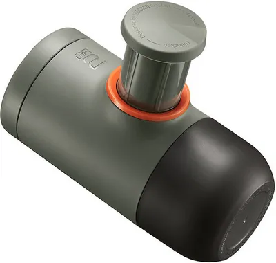 A portable espresso maker on a white background.