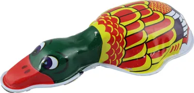 A colorful tin toy duck on a white background.