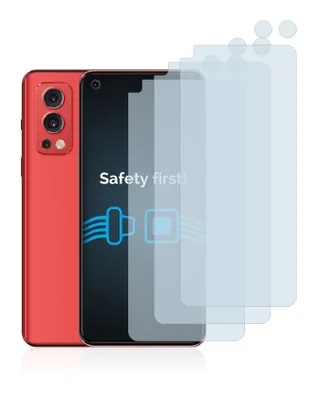 A red smartphone is shown next to several transparent screen protectors. The screen of the phone displays the text 'Safety first!' and a graphic.