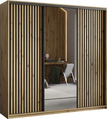 A modern wardrobe with sliding doors, featuring a slatted wood design and a mirrored section reflecting a room with a desk and chair.