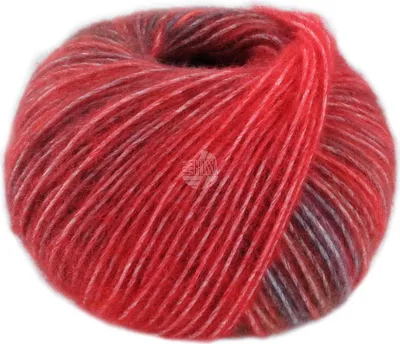 A ball of yarn with a gradient of red, brown, and white colors.