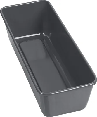 An empty loaf pan shown from a diagonal top-down perspective against a white background.