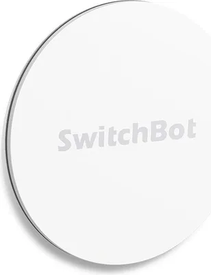 A close-up, angled view of a white, circular SwitchBot smart tag on a white background.