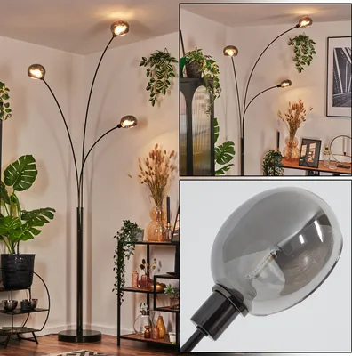 Produktbild von Suio Stehlampe aus Metall in Schwarz/Chrom/Rauch im Retro-Design
