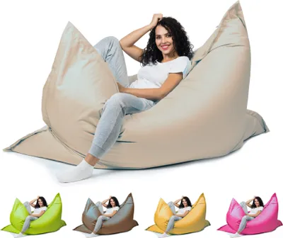 A woman sitting on a large beige beanbag chair, with smaller beanbag chairs in different colors shown below.