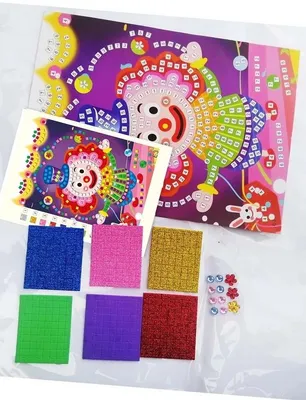 A craft kit for children featuring mosaic stickers and a clown design.