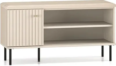 A light-colored shoe cabinet with a seat on top, featuring a fluted door and black legs, displayed against a white background.