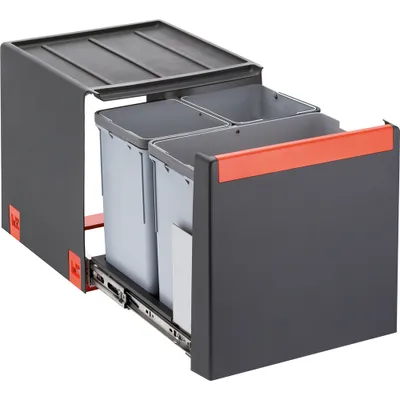A pull-out waste bin system with two compartments, designed for under-cabinet installation.