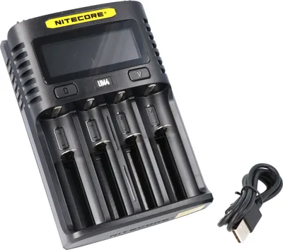 A Nitecore UM4 USB charger and its charging cable are shown against a white background.