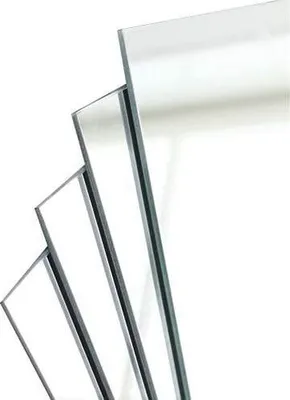 Several glass mirrors are stacked diagonally against a white background.