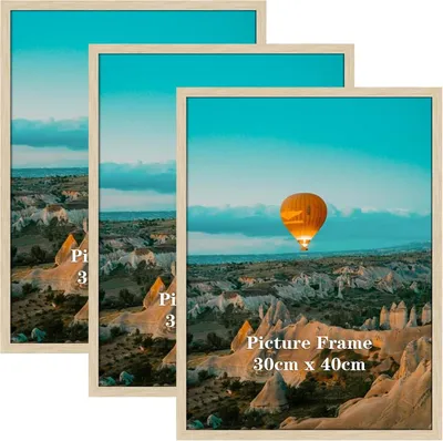Immagine prodotto di Set di 3 cornici per foto, colore legno, dimensioni 30 x 40 cm, da appendere a parete
