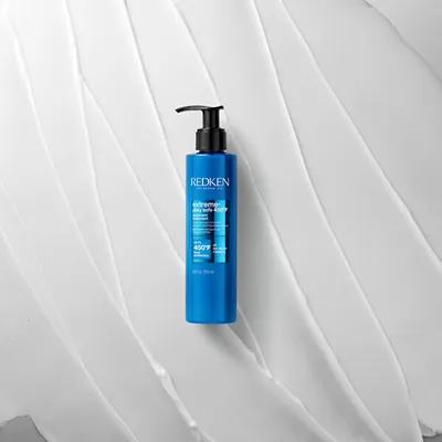 Produktbild von Redken Extreme Play Safe Hitzeschutz Schutzcreme, 250 ml, 3-in-1 Leave-in-Kur, heilt Spliss, bis 230°C für alle Haartypen