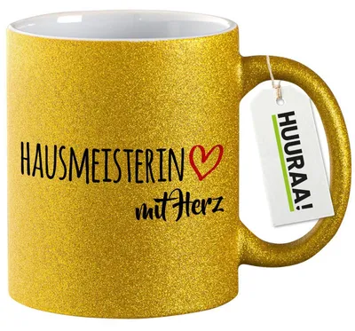 Produktbild von Huuraa Glitzertasse Hausmeisterin mit Herz 330ml Gold Keramik Kaffeebecher Geschenkidee