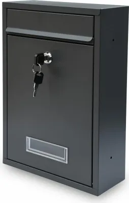 A dark gray mailbox with a key in the lock and a clear window for a nameplate.