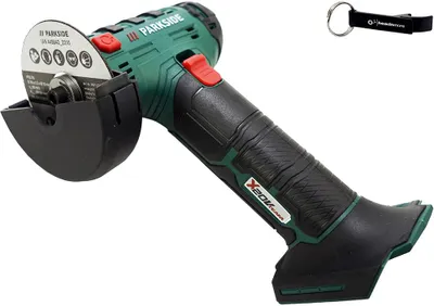 A cordless angle grinder and a keychain are displayed against a white background.