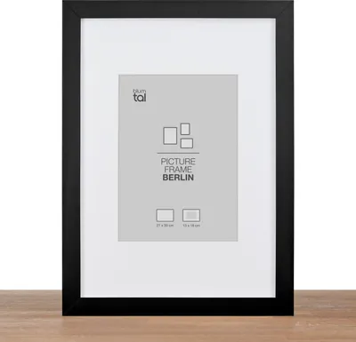 A black picture frame with a white mat and a grey insert showing product information.