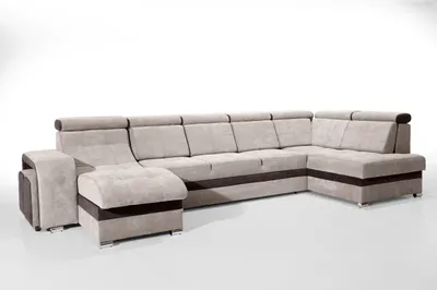 A sectional sofa with ottomans against a white background.