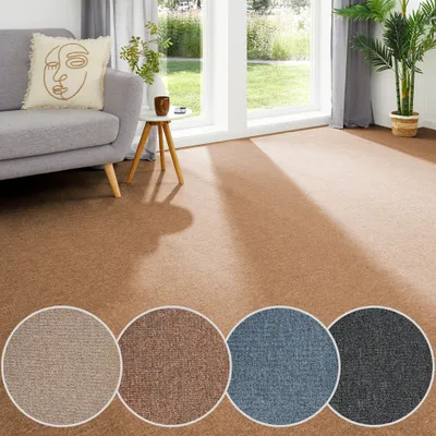 Teppichboden als Auslegware in cognac mit Farbmustern in beige, blau, anthrazit. 
