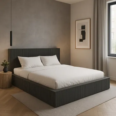 A bedroom scene with a bed, nightstand, and artwork.