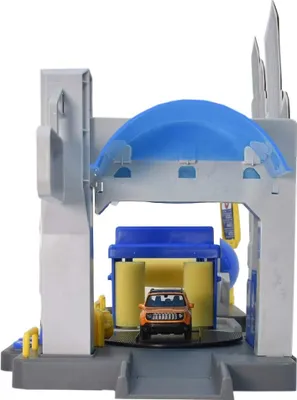 A toy car wash playset with a toy car inside.