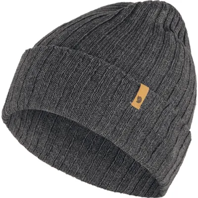 A close-up studio shot of a dark gray knitted beanie.