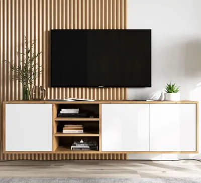 A modern media console with a wall-mounted television above it, set against a slatted wooden wall.