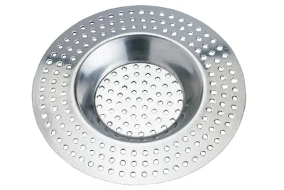 A silver metal sink strainer with many small holes.