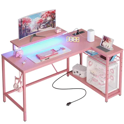 Produktbild von Bestier Gaming-Eckschreibtisch L-Form 132 cm – mit LED, Steckdosen, 2 Regalen & Haken – Umkehrbarer Computertisch für kleines Büro, Rosa