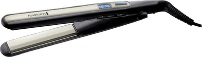 A black and silver Remington S6500 hair straightener is shown against a white background.