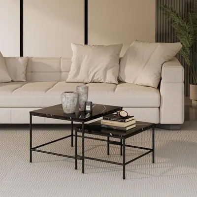 A living room scene with a couch and coffee tables.
