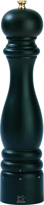 A black Peugeot Paris pepper mill with a gold top.
