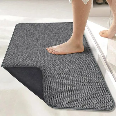 Produktbild von Unyqoos® dünne, rutschfeste Badematte 40 x 60 cm, grau – kurzflorige Frottee-Oberfläche mit Gummirückseite, saugfähig für Bad und WC
