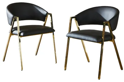 Productafbeelding van Eetkamerstoelen, set van 2, zwart kunstleer, gouden metalen frame, gebogen rugleuning, verstelbare voetsteunen en een zithoogte van 49 cm