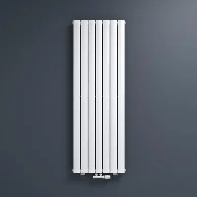 A white vertical radiator is mounted on a dark gray wall.