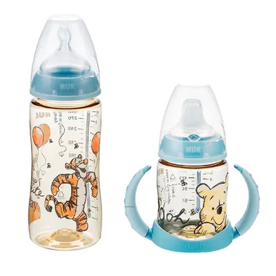 Produktbild von NUK Babytrinklernflasche/Trinklernbecher Disney "Winnie" 150 ml Trinklern-Flasche mit Trinktülle aus Silikon u. Griff mit  Babyflasche 300ml 1M Sauger