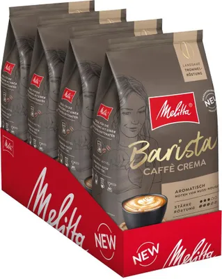A display of multiple bags of Melitta Barista Caffè Crema coffee beans, presented in a red cardboard display box.